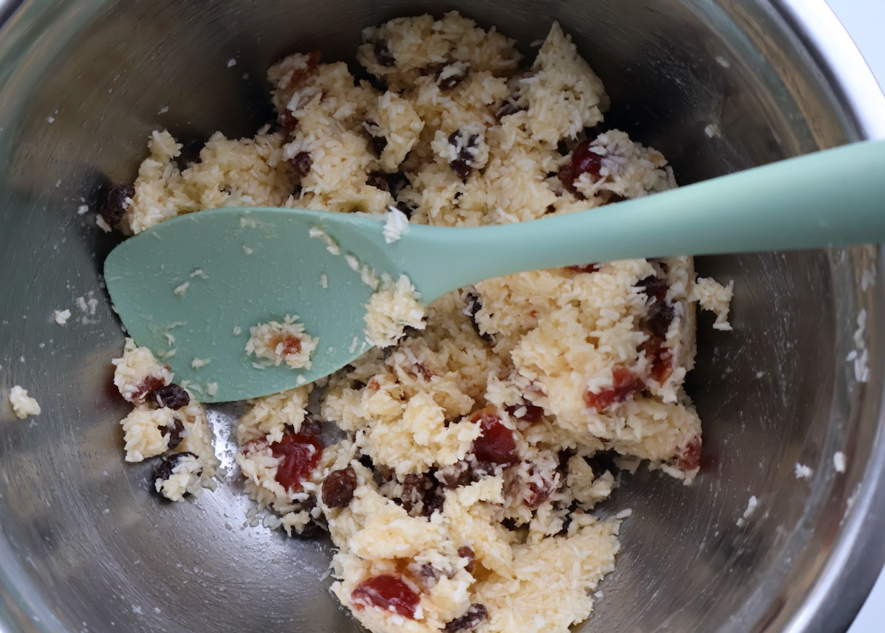 Mixture for chocolate picnic slice in a stainless steel bowl