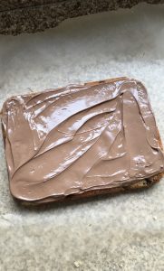 Melted chocolate on picnic slice