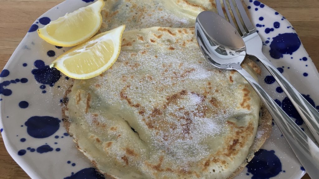 Gluten free pancakes with sugar and lemon