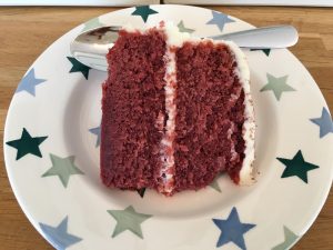 Slice of gluten free red velvet cake