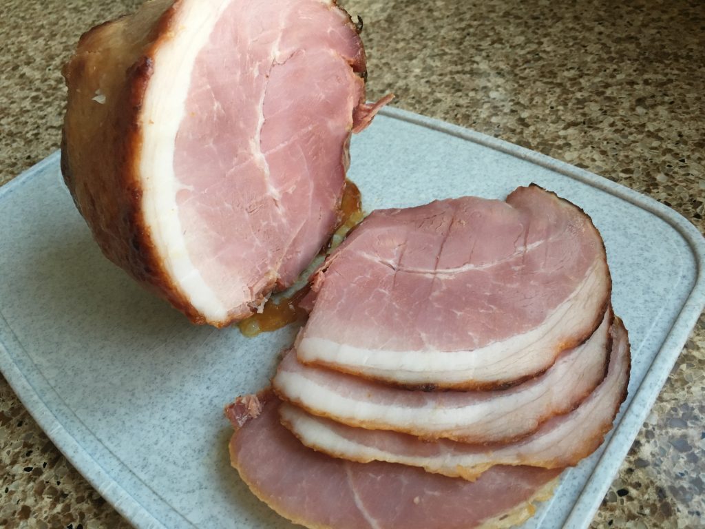 Honey and mustard glazed ham. Sliced.