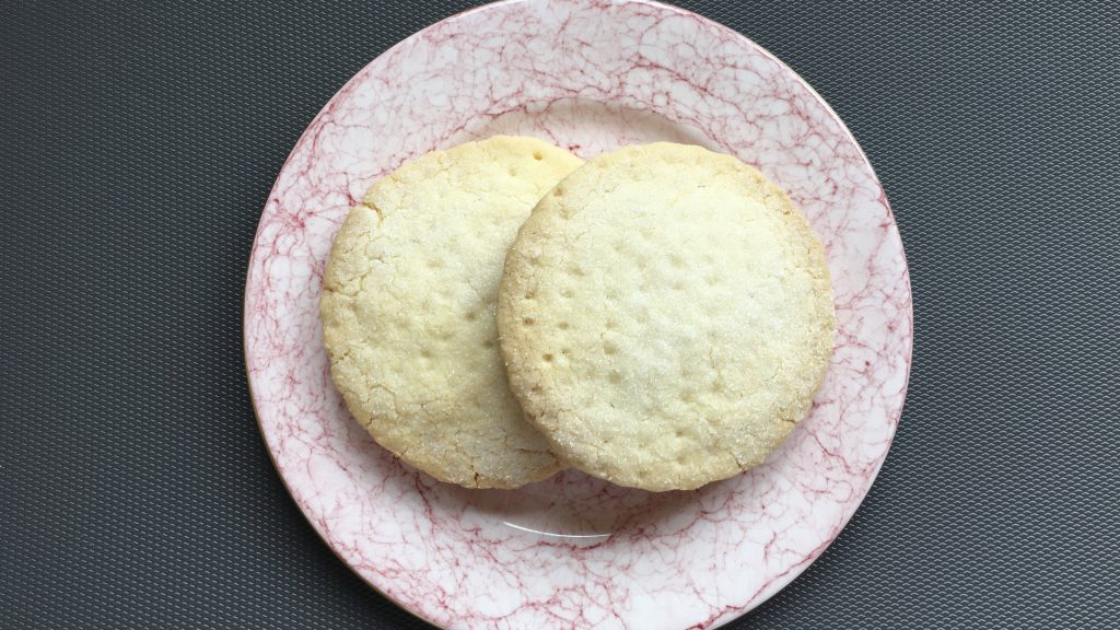 Gluten free shortbread biscuits on a lovely pink china plate
