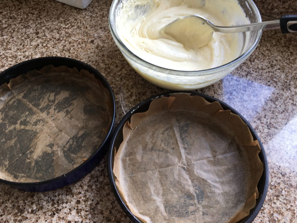 Gluten free sponge mix and 2 greased and lined sandwich tins