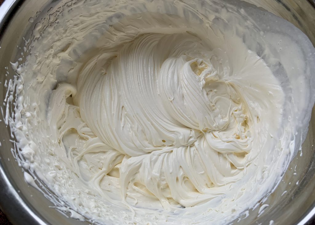 Whipped double cream for gluten free Black Forest gateau