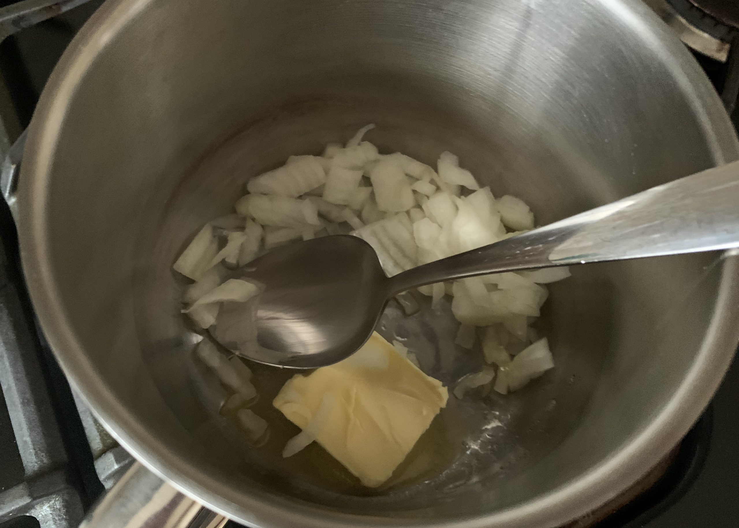 Onions and butter for mini gluten free chicken and ham pies