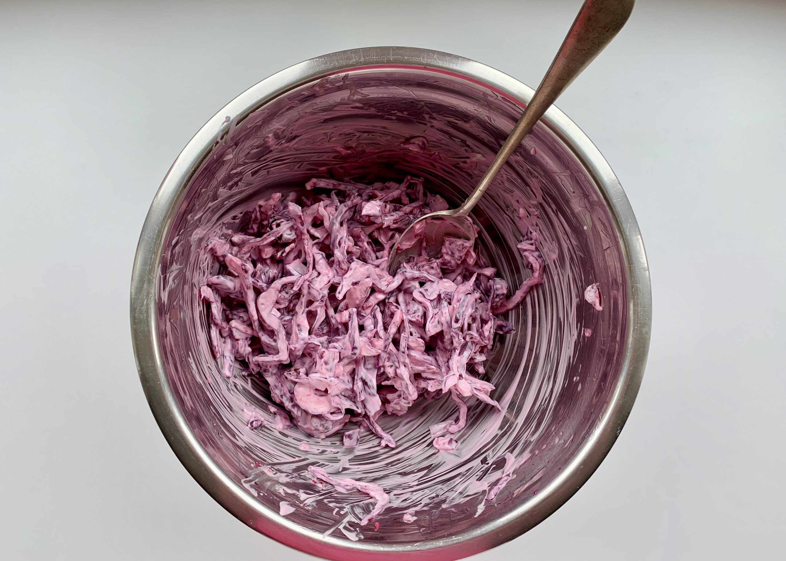 Red slaw in a large mixing bowl