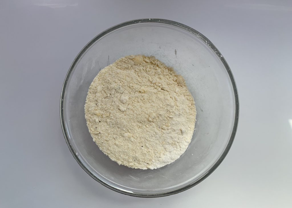 Base mixture for gluten free scones in a large glass bowl