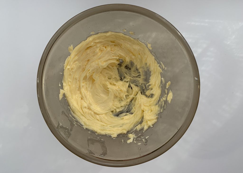 Creamed butter in a pyrex bowl