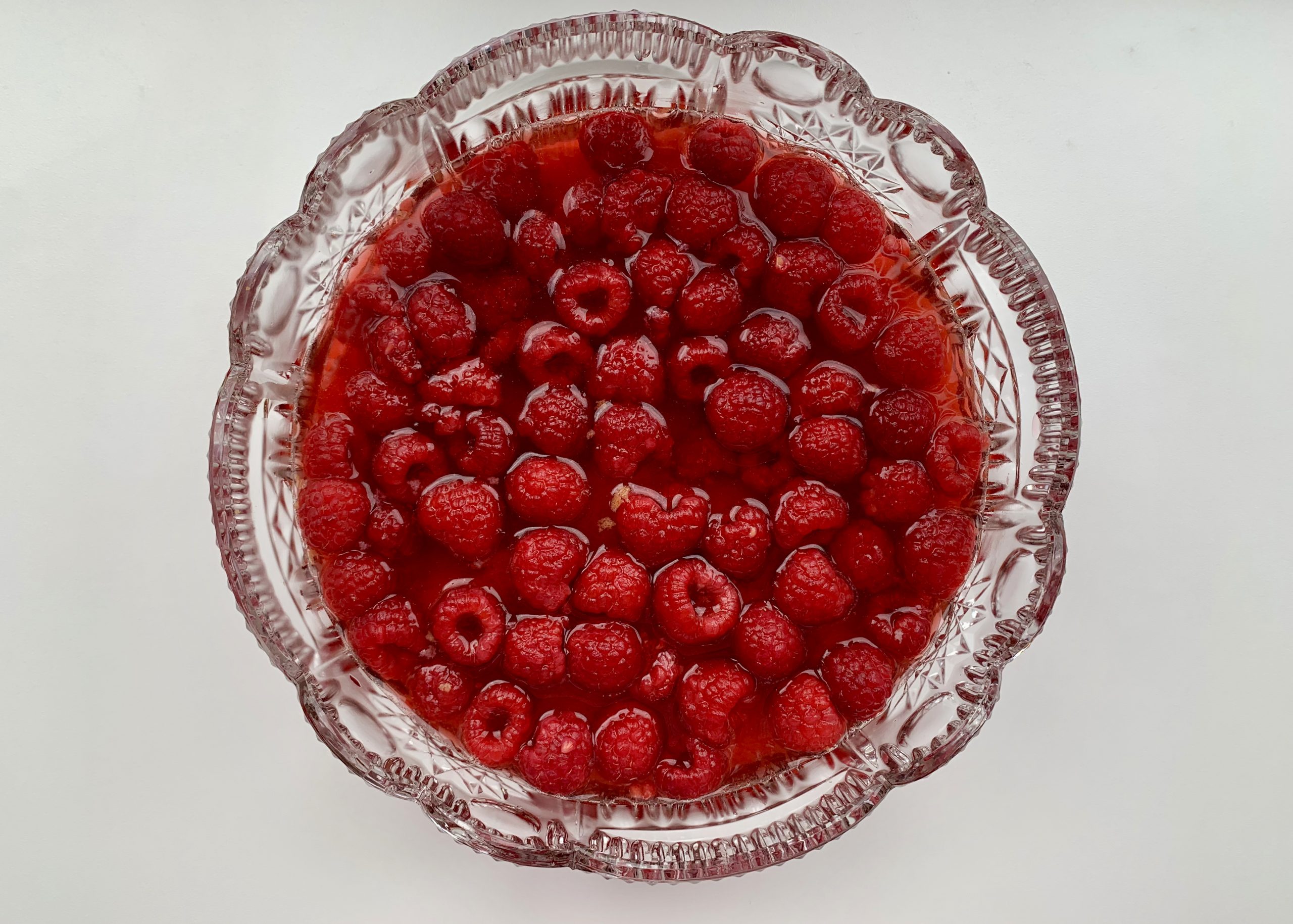 The base for a gluten free trifle in a glass bowl