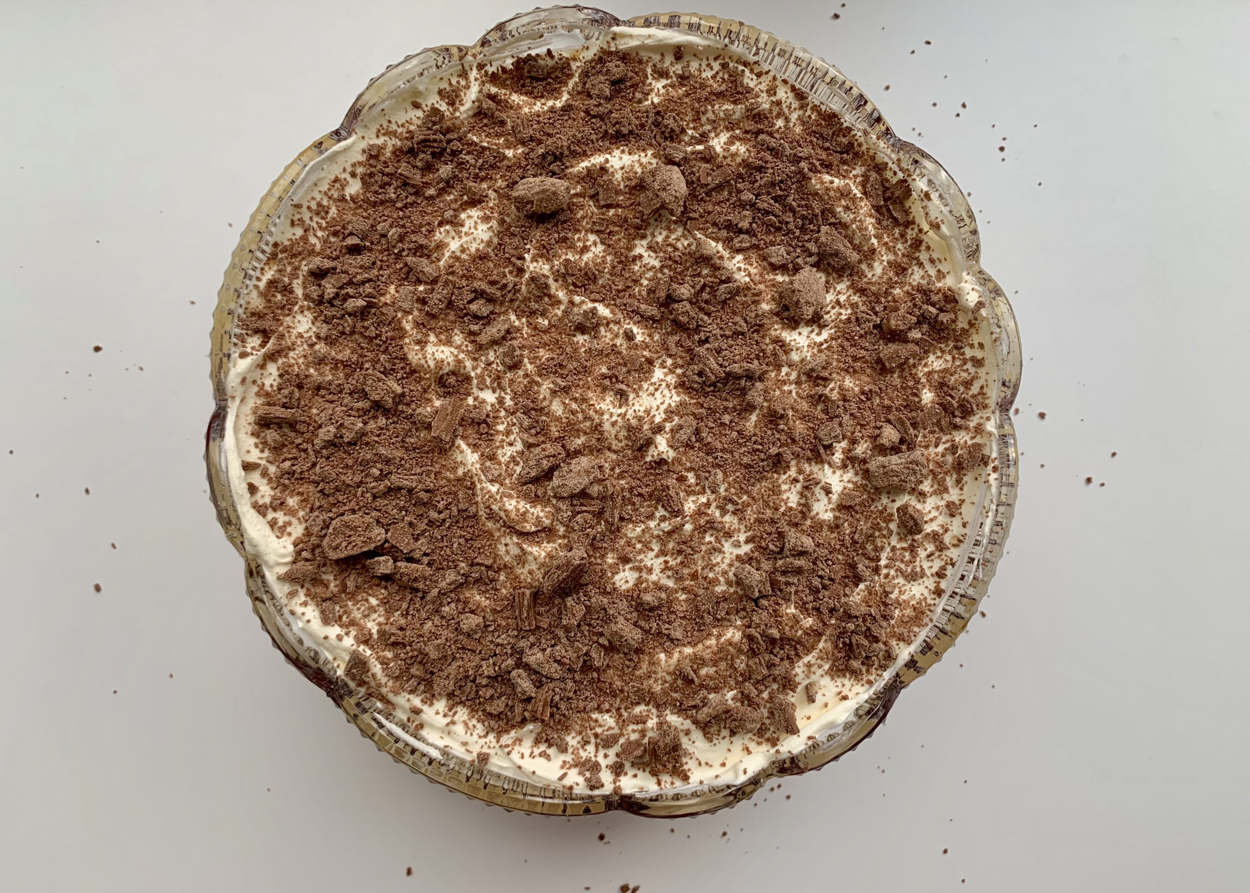 Gluten free trifle topped with crumbled chocolate