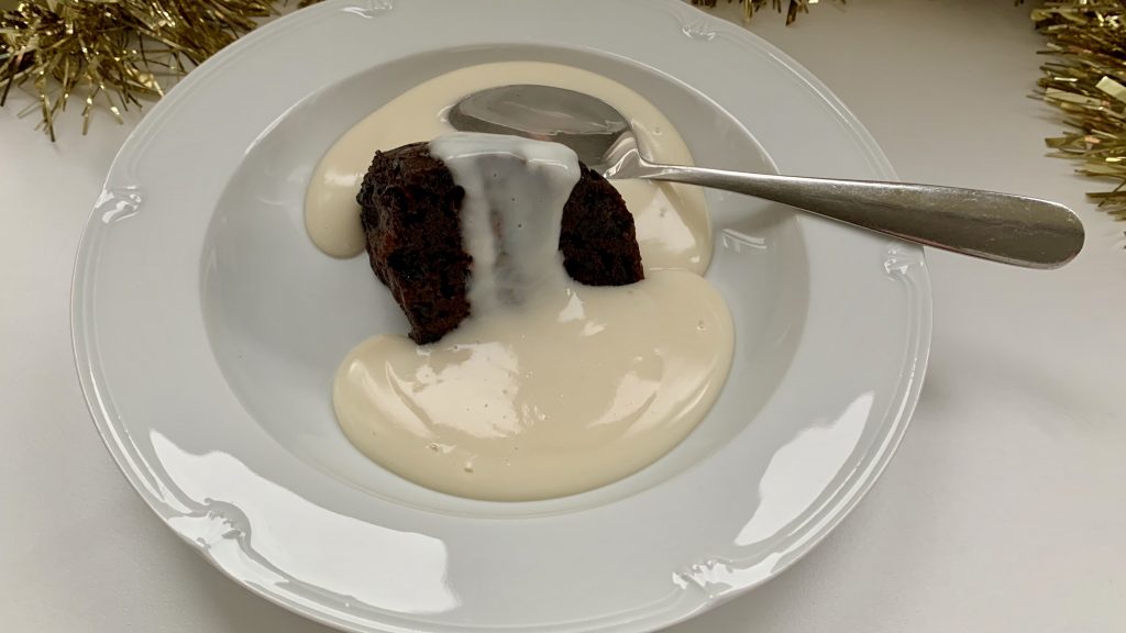 Gluten free Christmas pudding with brandy sauce