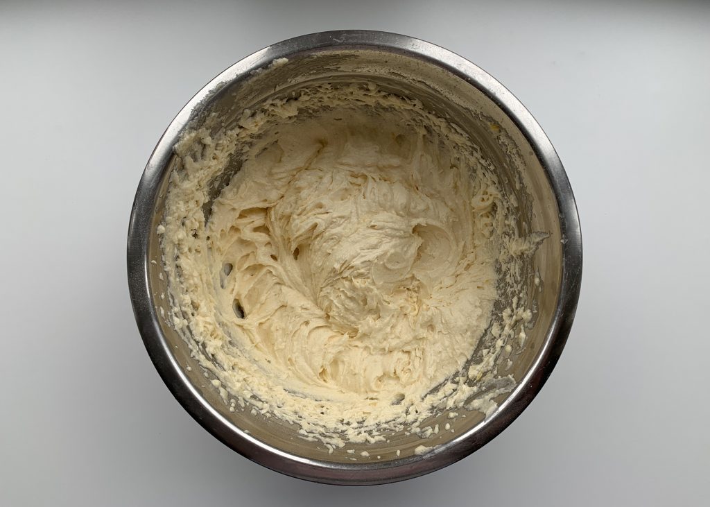 Sponge mixture in a stainless steel bowl