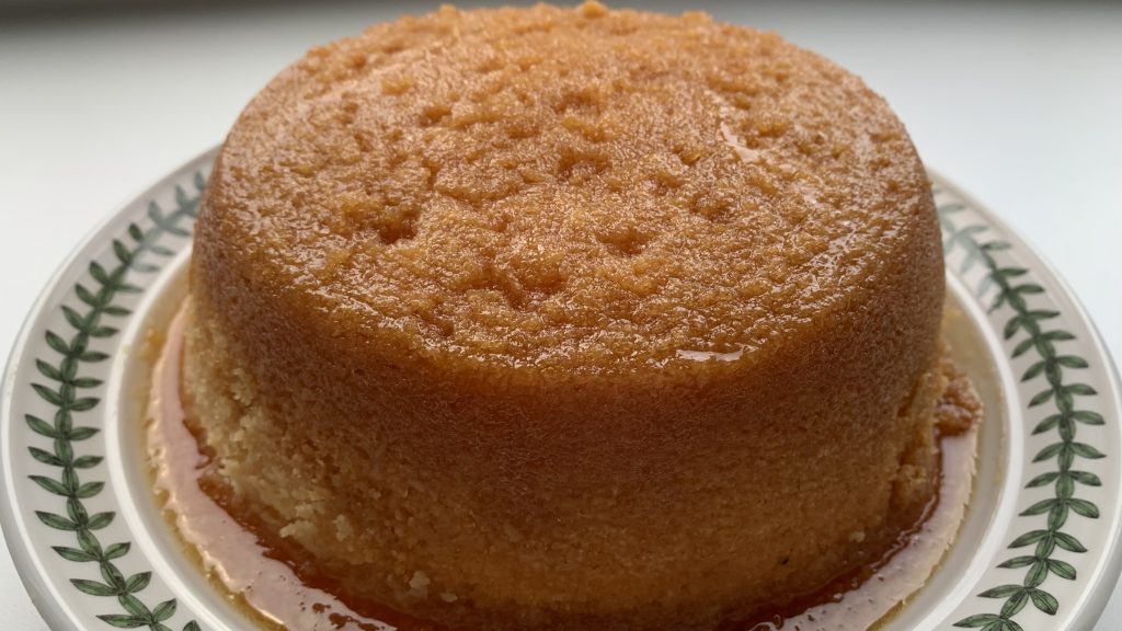 Gluten free steamed syrup sponge on a plate
