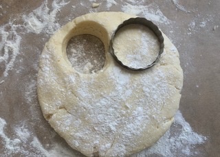 Gluten free scone dough being cut out into scones