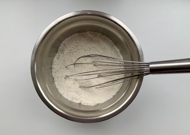 Gluten free flour in a stainless steel bowl