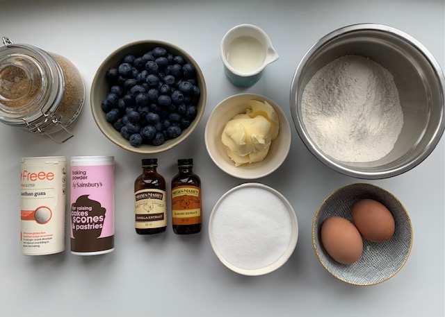 Flatlay of ingredienst for blueberry muffins