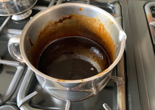 Melted butter, treacle and sugar in a pan