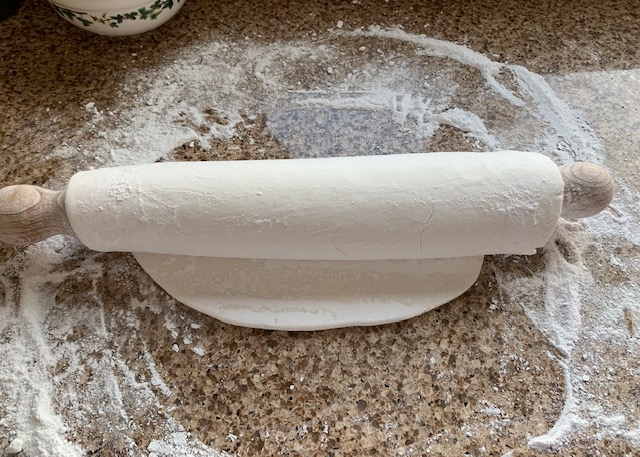 Fondant icing wrapped around a rolling pin