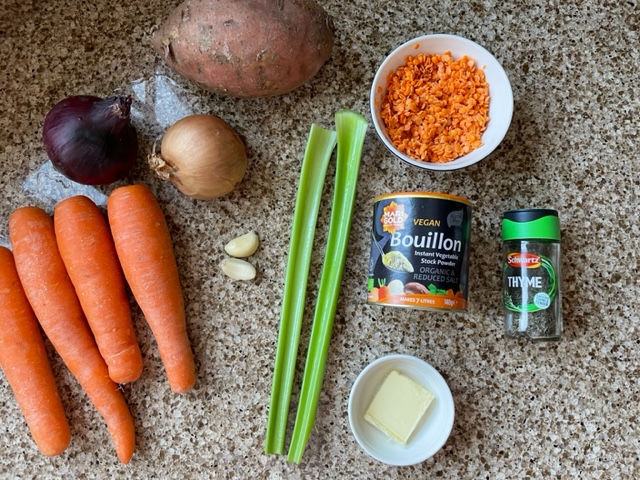 Ingredients to make sweet potato, carrot and lentil soup