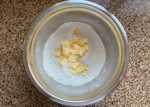 Dry ingredients and butter for gluten free sweet pastry