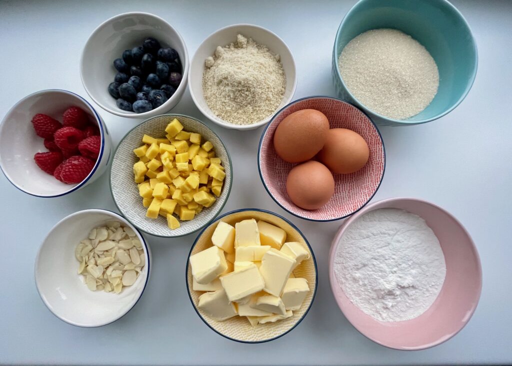 Ingredients for gluten free berry and marzipan loaf cake