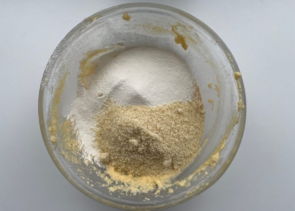 Basic gluten free cake ingredients in a glass bowl