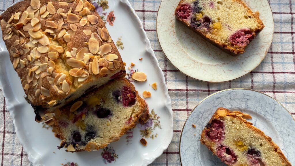 Sliced gluten free berry and marzipan cake