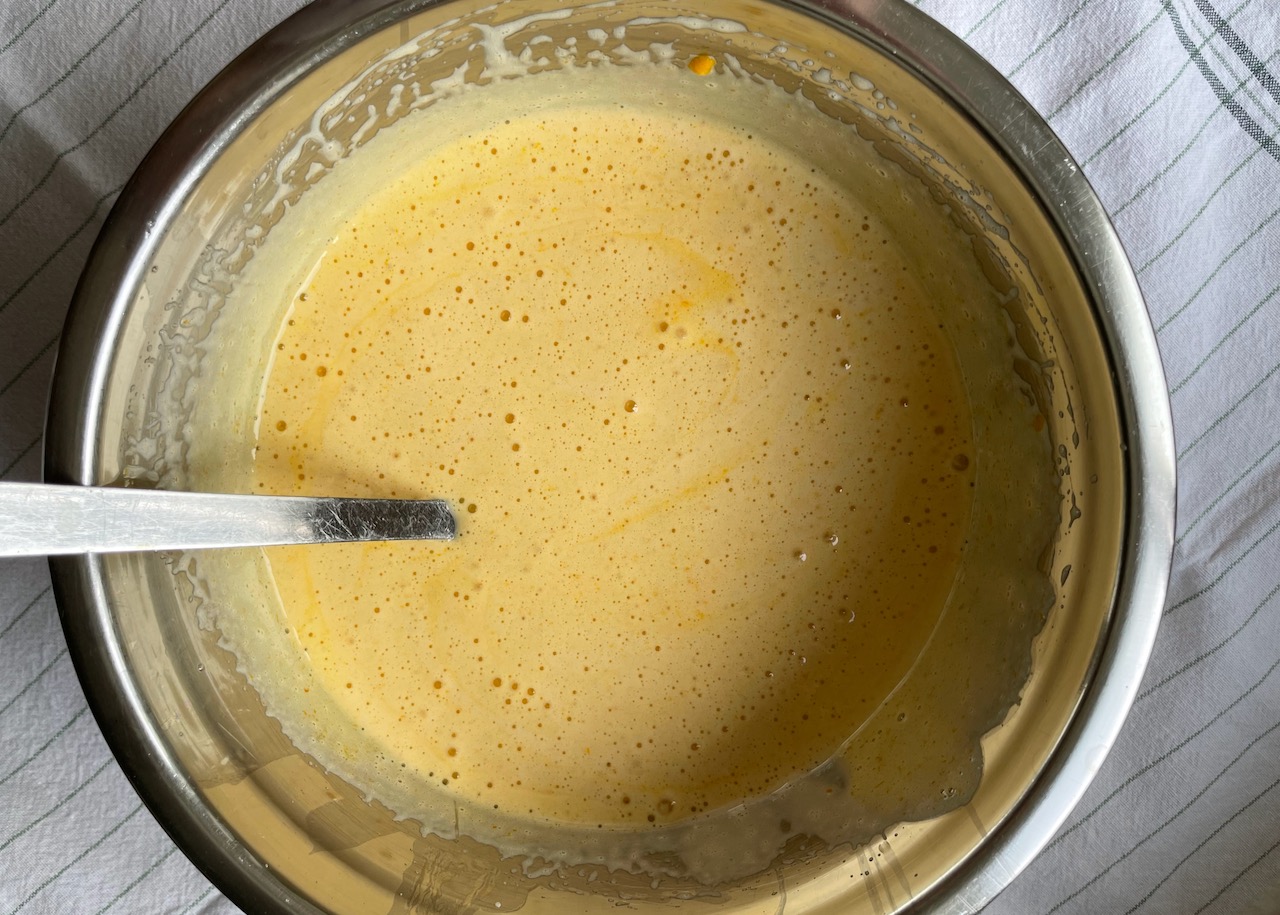 Beaten eggs and sugar with added satsuma puree 