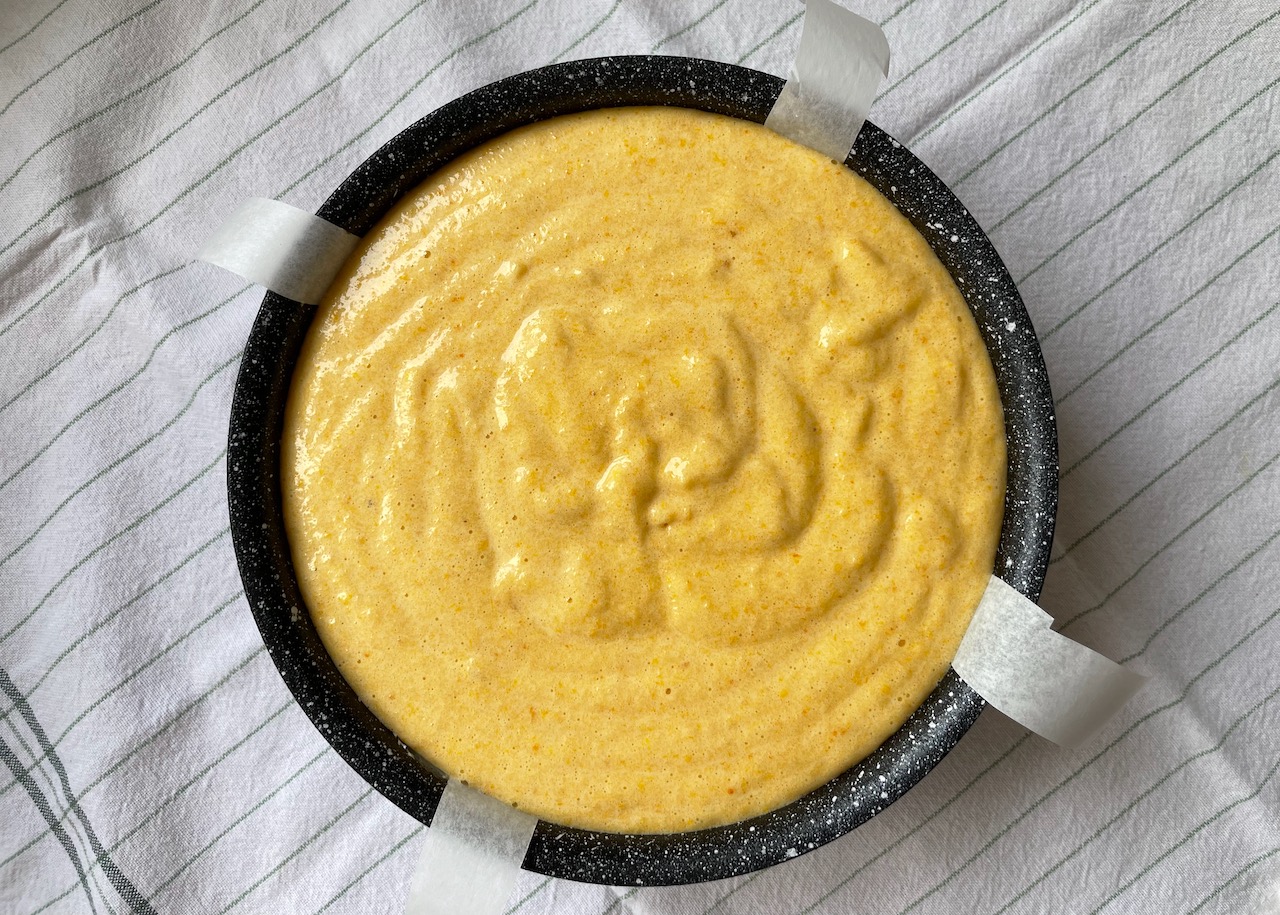 Mixture in the tin for boiled clementine cake